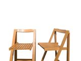 two wooden chairs sitting next to each other on a white background