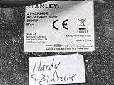 a sign on the back of a car that says stanley