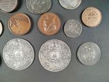 a lot of coins that are sitting on a table