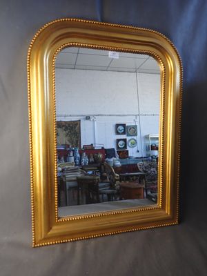 a mirror that is sitting on a table