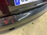 a license plate on the back of a car
