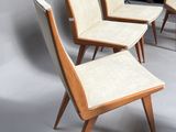 set of four mid - century chairs with upholstered backrests