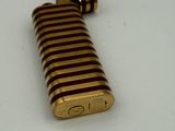 a lighter that is sitting on a white table