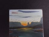 a picture of a painting of a sunset over a body of water