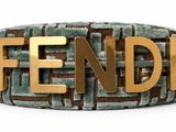 a close up of a bracelet with the word fendi on it