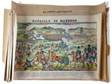 an old book with a picture of a battle in the middle of it