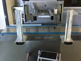 a machine that is sitting on the floor in the room