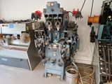 many machines that are sitting in a room together