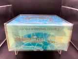 a clear box with a logo on it sitting on a chair
