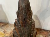 pair of carved wood sculptures of a frog on a rock