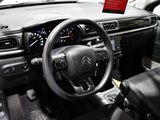 the interior of a car with a steering wheel, dashboard, and dash board
