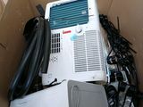 a box with a computer and other electronics inside of it