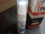 a bottle of toothpaste next to a box of toothpaste