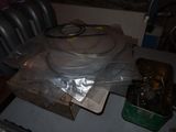 a plastic container with a hose on top of a table