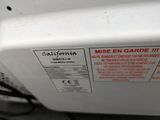 a close up of a microwave oven with a label on it