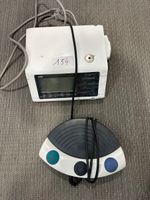 Un moteur d'implantologie SURGIC PRO NSK avec pédale