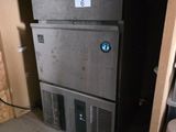 an image of a refrigerator in the corner of a room
