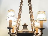 an image of a chandelier with three lamps hanging from it