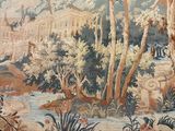 a picture of a tapestry hanging on a wall