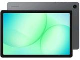 the tablet is sitting on a white surface with a green background