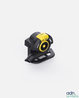 a close up of a yellow and black camera on a white surface