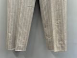 a close up of a pair of pants hanging on a wall