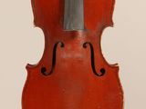 a close up of a violin with a bow on a white background