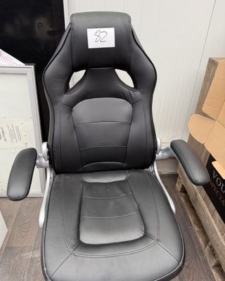 an image of a black office chair in a room