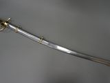 an image of a sword on display on a table