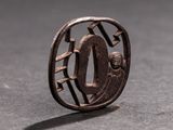 a small metal object that is sitting on a table