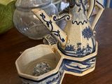 two vases and a teapot on a table