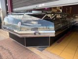 a display case in the middle of a store