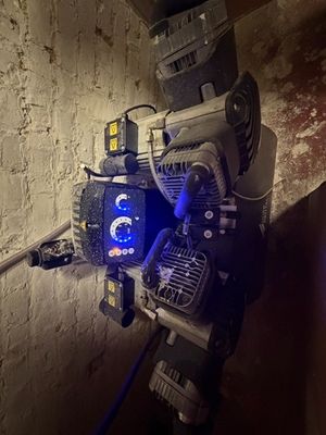 an image of a robot with a clock on it ' s back
