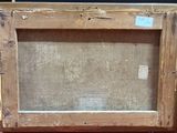 an old picture of a wooden frame sitting on top of a table