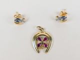a pair of gold and diamond earrings and a pendant