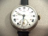 a close up of a watch with roman numerals on it
