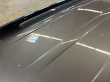 a close up of the hood of a car