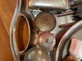 a metal tray with a lot of different items in it