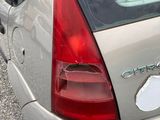 a car that has a sticker on the back of it