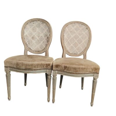paire de chaises de salle à manger vintage à dossier en osier, de fabrication française
