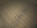 the signature of a baseball player is on the table