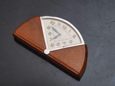 a clock that is sitting on top of a table