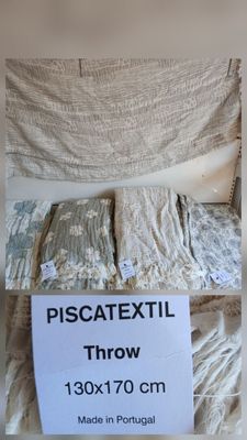 a picture of a pillow on a bed with a price tag attached to it