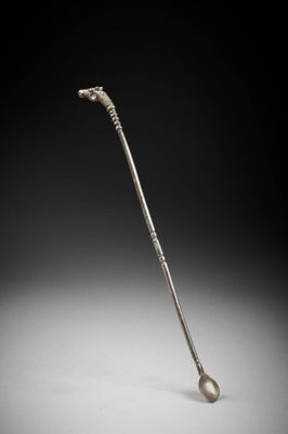 an image of a golf club with a ball on it