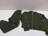 the jacket and pants are green with gold letters on them