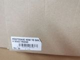 a box with a label on it that says how to save a dead friend