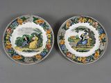 two plates with a picture of a man and a woman on them