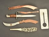 five different types of knives and a knife sharper