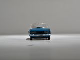 a small toy car that is sitting on a table