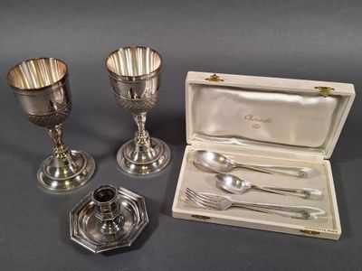 three silver plated silverware including a silver cup, spoon, and a silver plate